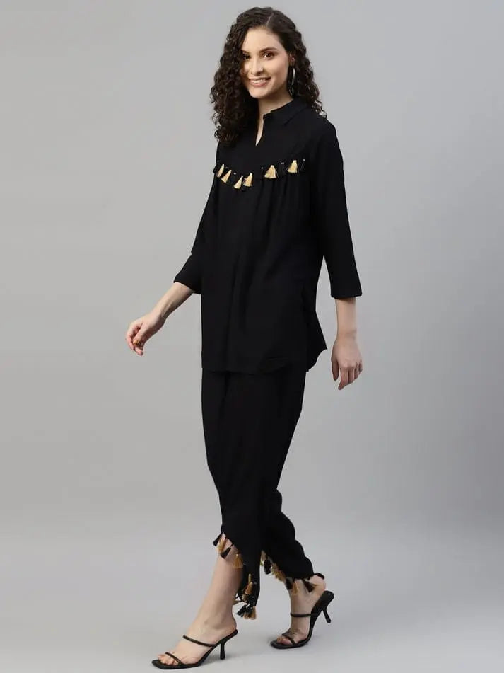 Tunic and Trousers Black solid Tunic has round neck Three Quarter sleeve full placket and regular waist hem Black solid mid-rise Trousers has Slip on closure - NextBuy