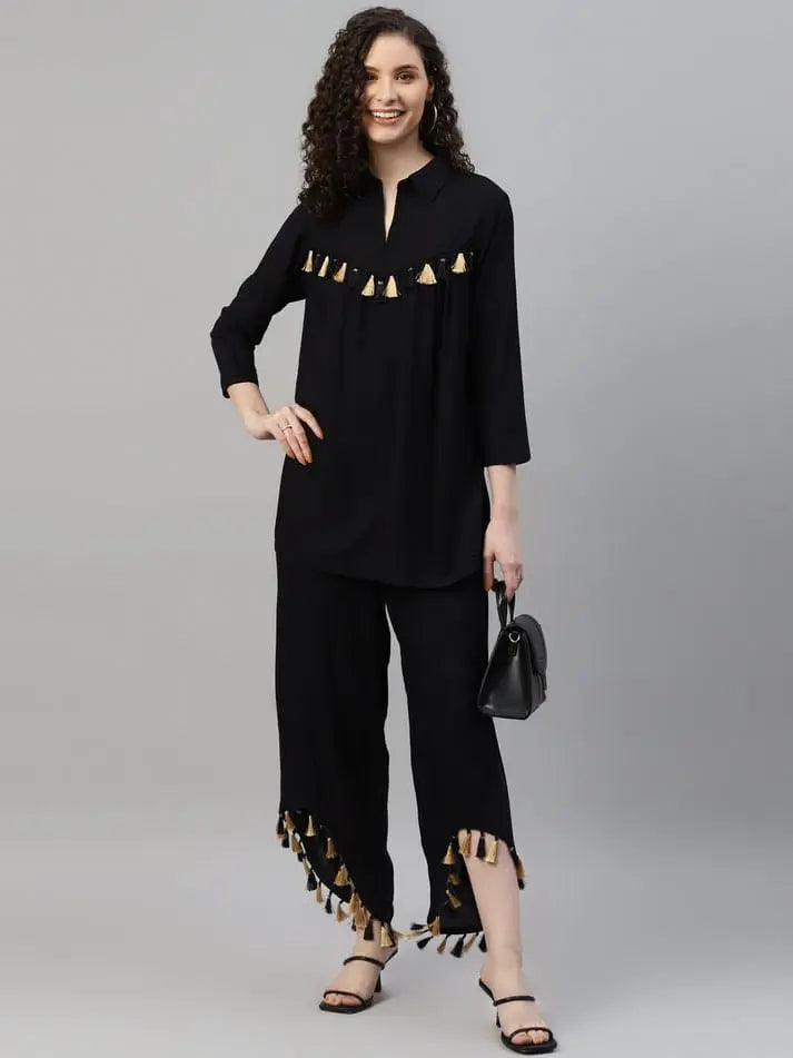 Tunic and Trousers Black solid Tunic has round neck Three Quarter sleeve full placket and regular waist hem Black solid mid-rise Trousers has Slip on closure - NextBuy