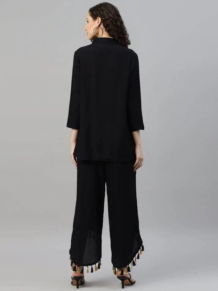 Tunic and Trousers Black solid Tunic has round neck Three Quarter sleeve full placket and regular waist hem Black solid mid-rise Trousers has Slip on closure - NextBuy