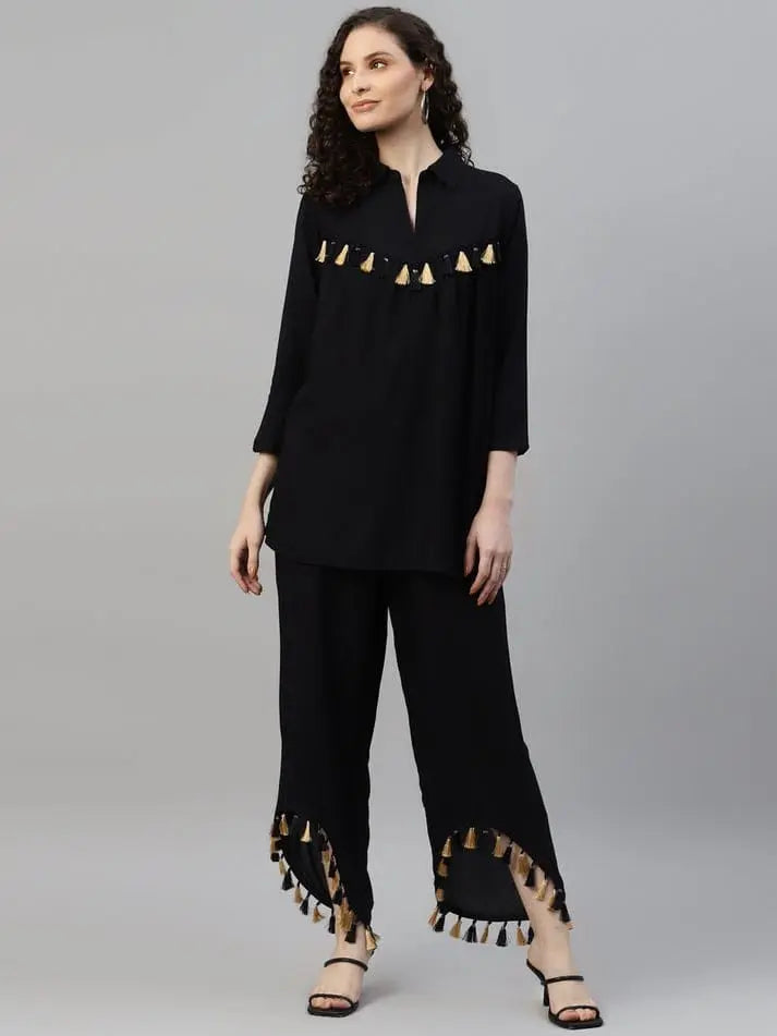 Tunic and Trousers Black solid Tunic has round neck Three Quarter sleeve full placket and regular waist hem Black solid mid-rise Trousers has Slip on closure - NextBuy