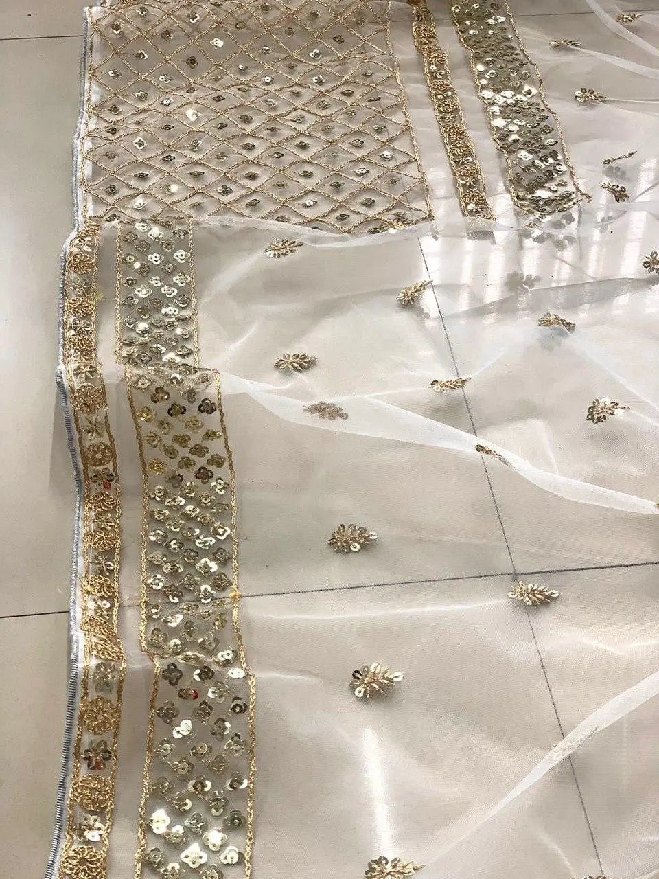 Embellished Sequinned Net Saree NextBuy