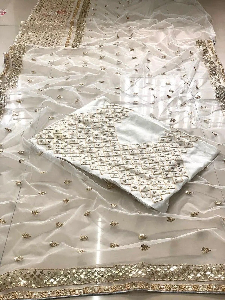 Embellished Sequinned Net Saree NextBuy