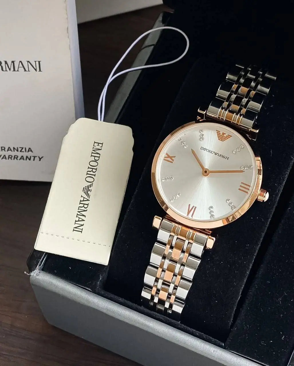 Close-up of diamond-studded mother-of-pearl dial