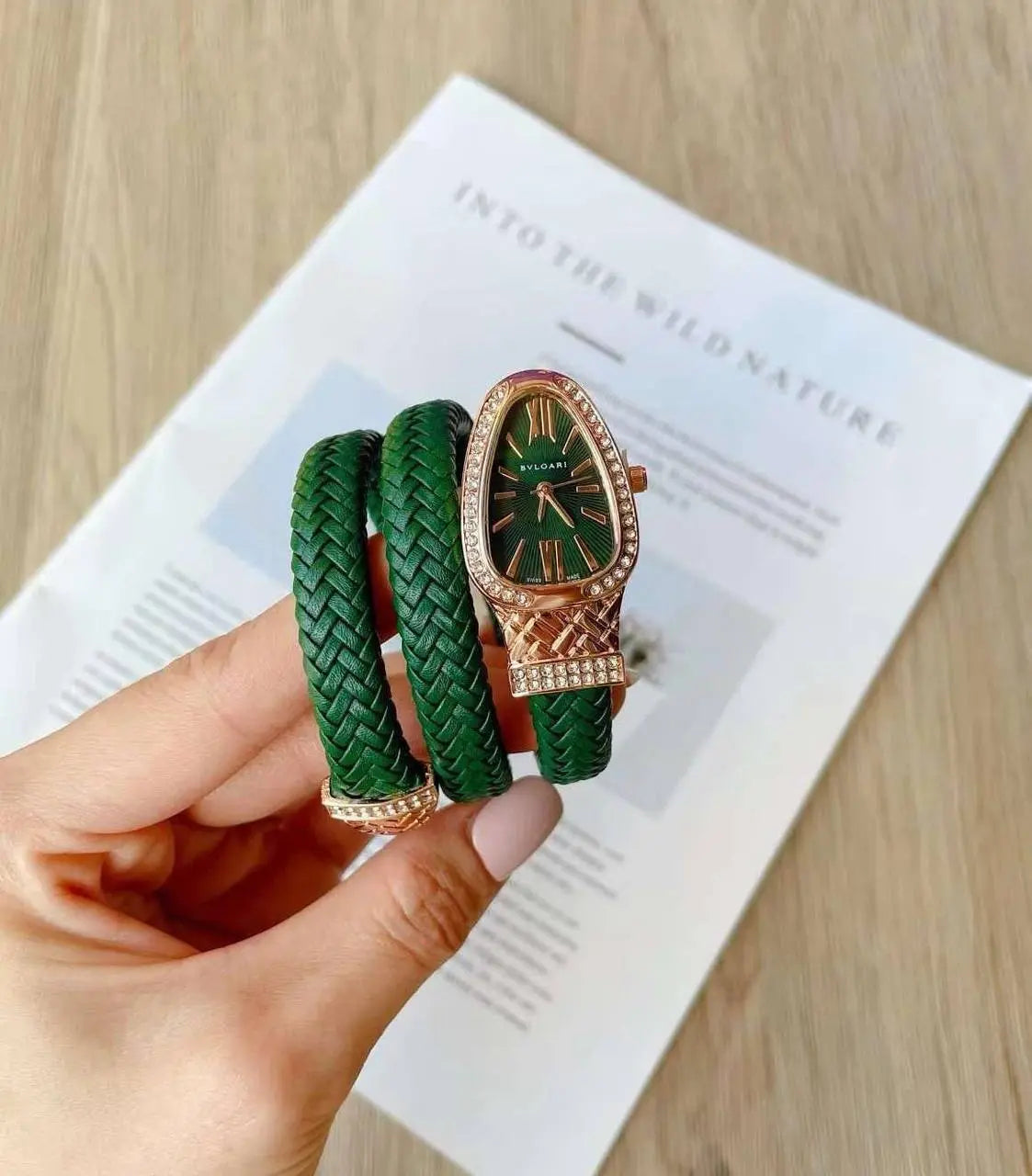 Gold-tone Bvlgari Serpenti watch with spiral bracelet