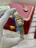 Close-up of diamond-studded Cartier face