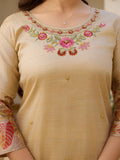Suit set laid out with top, bottom, and dupatta