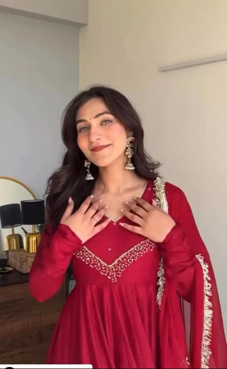 Front view of star georgette gown with embroidery