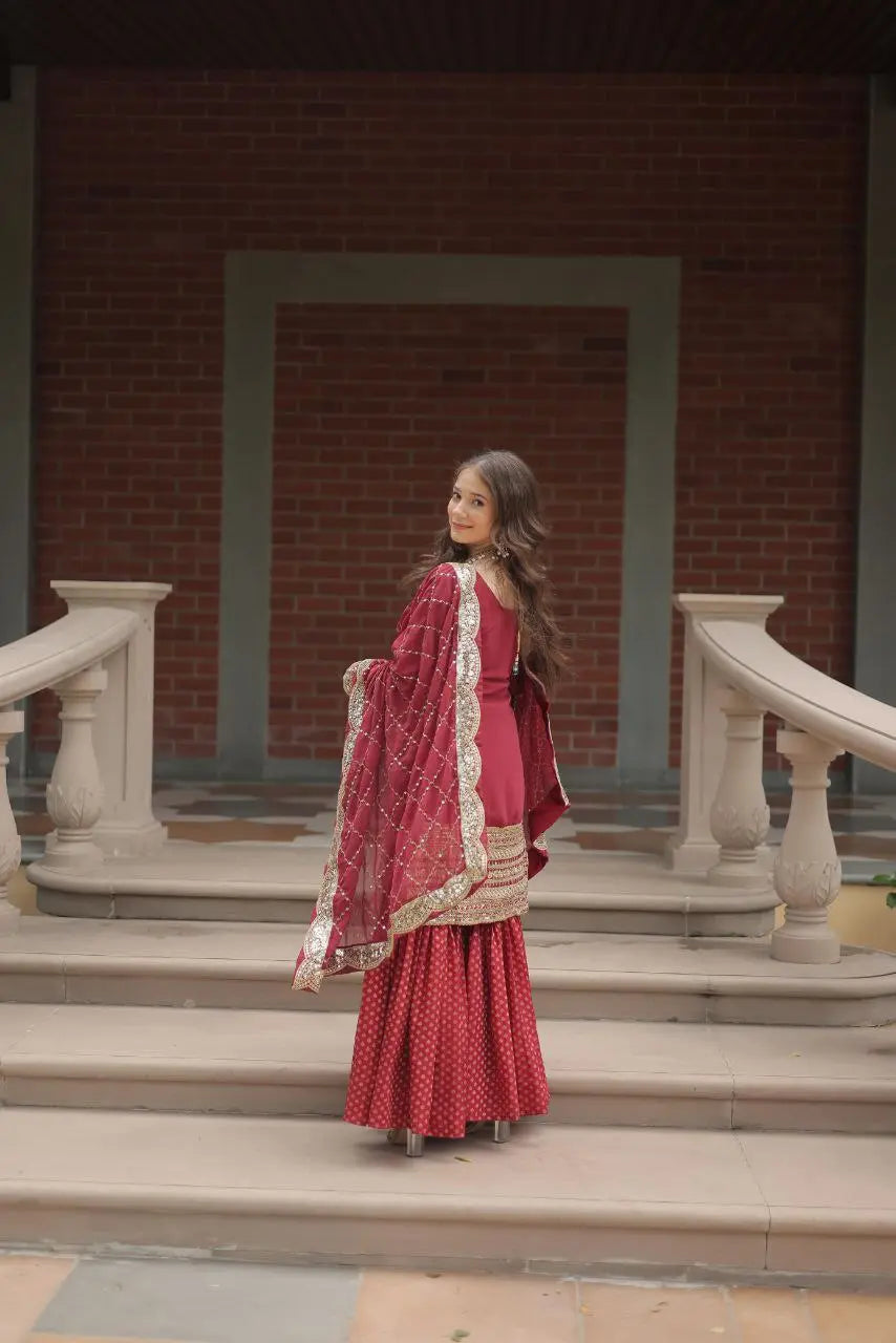 Close-up of sequin and thread work on kurti