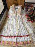 Anarkali outfit displayed with accessories