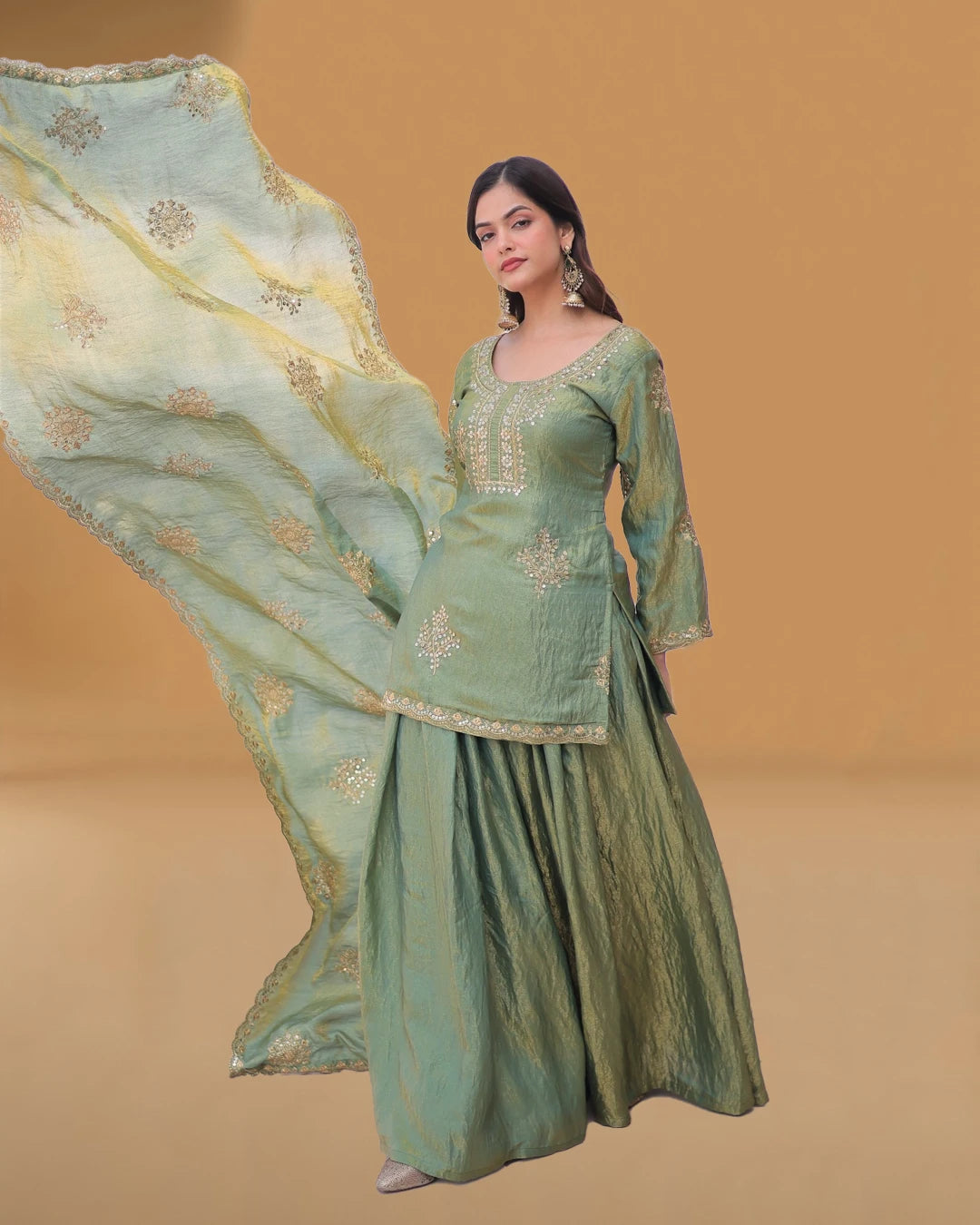 Close view of zari embroidery on kurti
