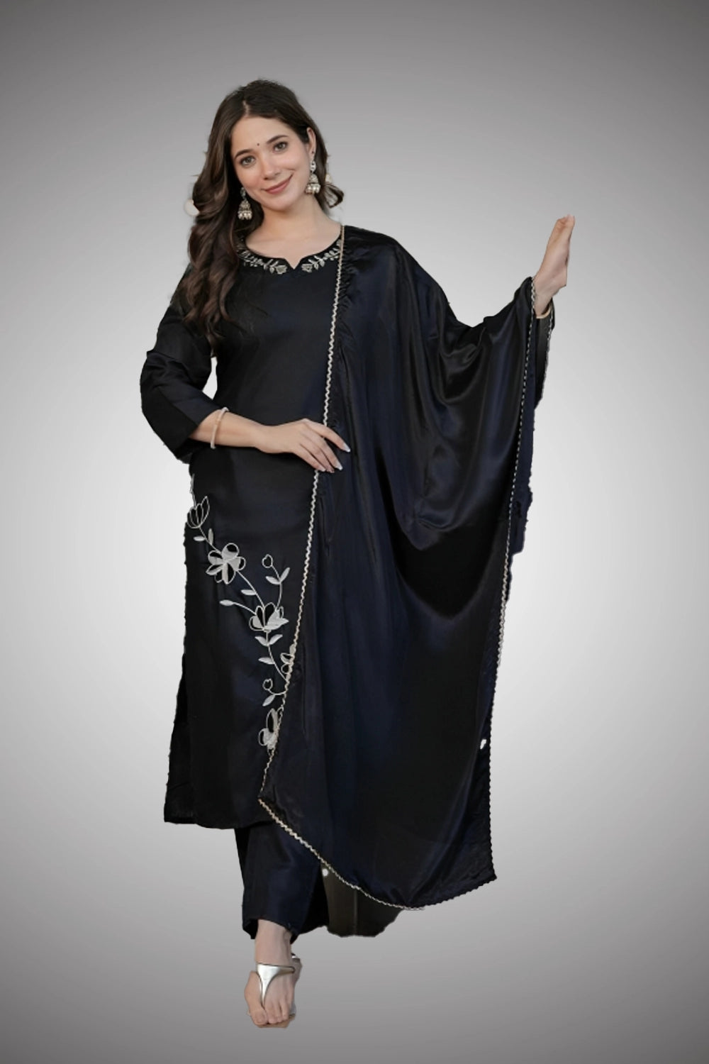 Flat lay of kurti, pant, and dupatta