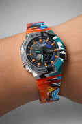 G-Shock GM-2100 metal bezel watch with orange strap
