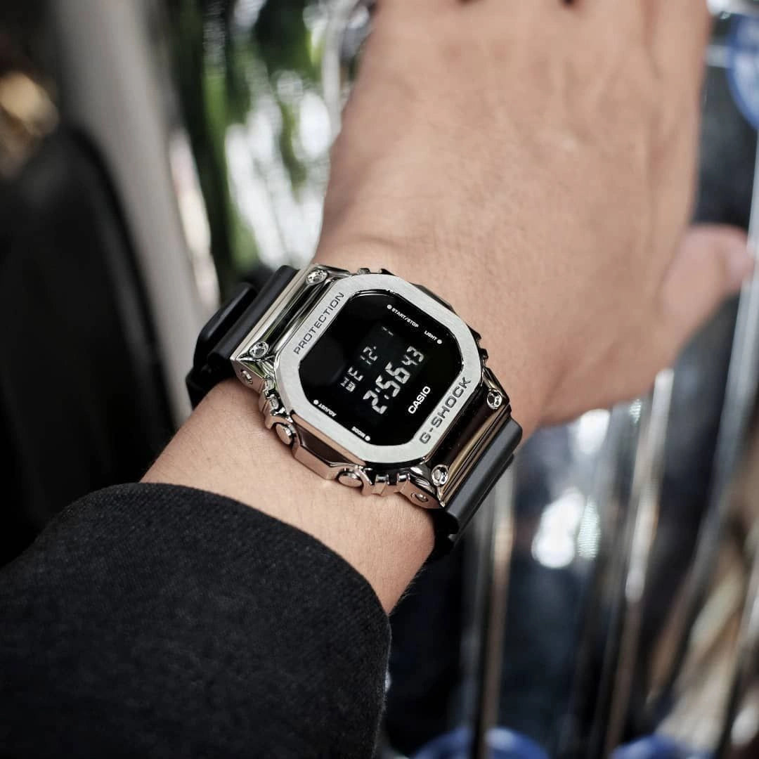 G-Shock metal body digital watch with black strap close-up