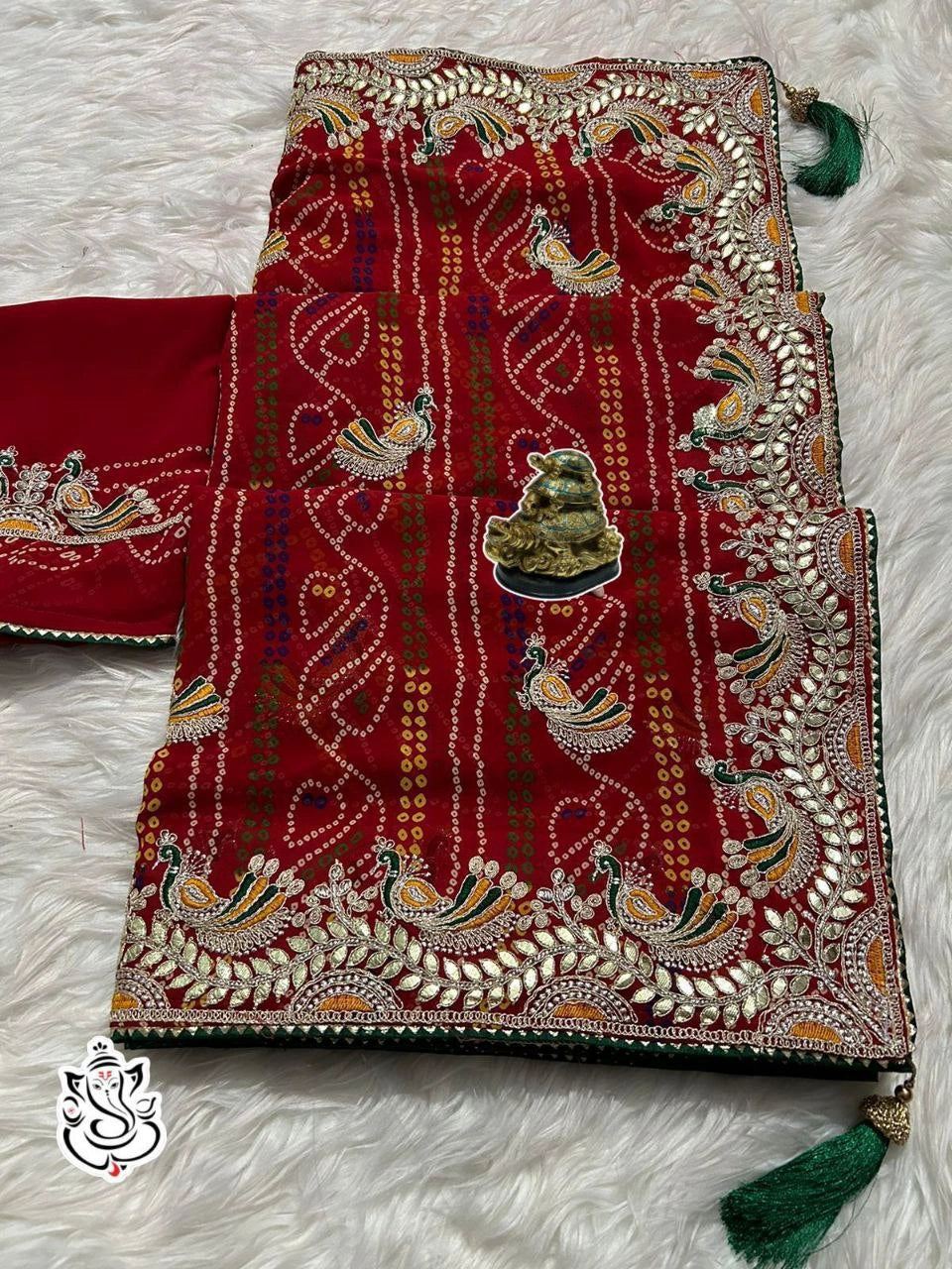 Georgette saree with latkan and piping border