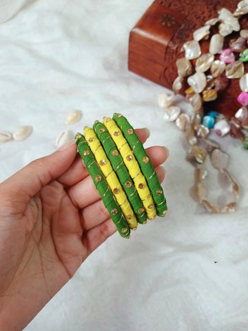 Handmade green and yellow fabric bangle set with stone work from Berhampore, Murshidabad