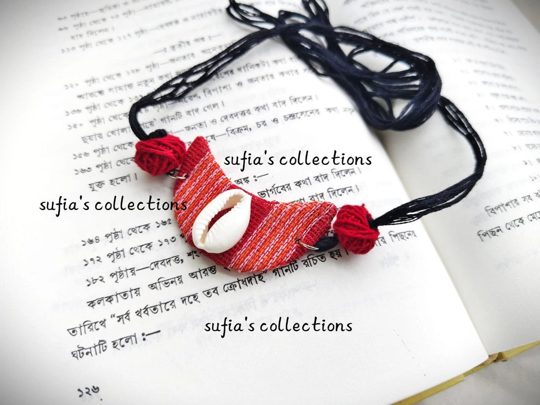 Handmade fabric necklace with red fabric design and cowrie shell pendant from Berhampore, Murshidabad