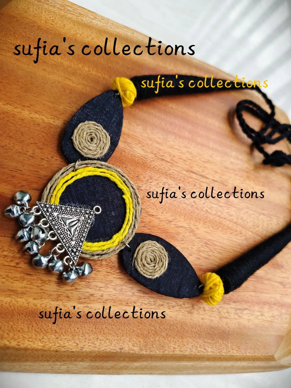 Handmade fabric thread necklace with oxidized silver pendant and ghungroo from Berhampore, Murshidabad