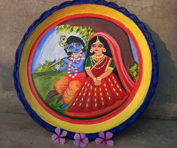 Handpainted terracotta wall plate with Radha Krishna design – traditional Indian folk art décor handmade in India