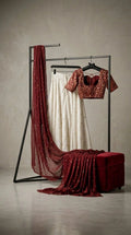 Wedding guest cream lehenga with maroon dupatta