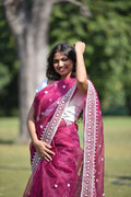 Close-up of multicolor embroidery on saree