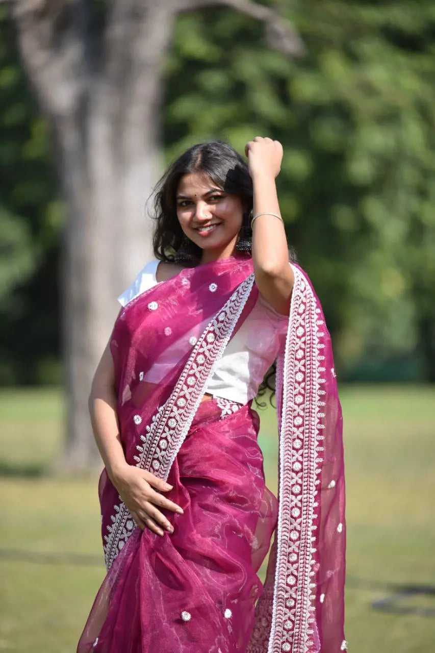 Close-up of multicolor embroidery on saree