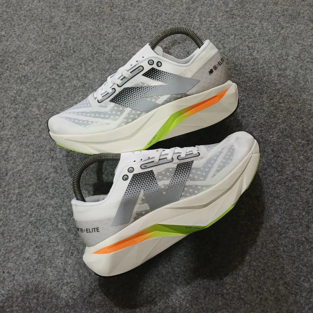 New Balance Elite white running shoes for men side view