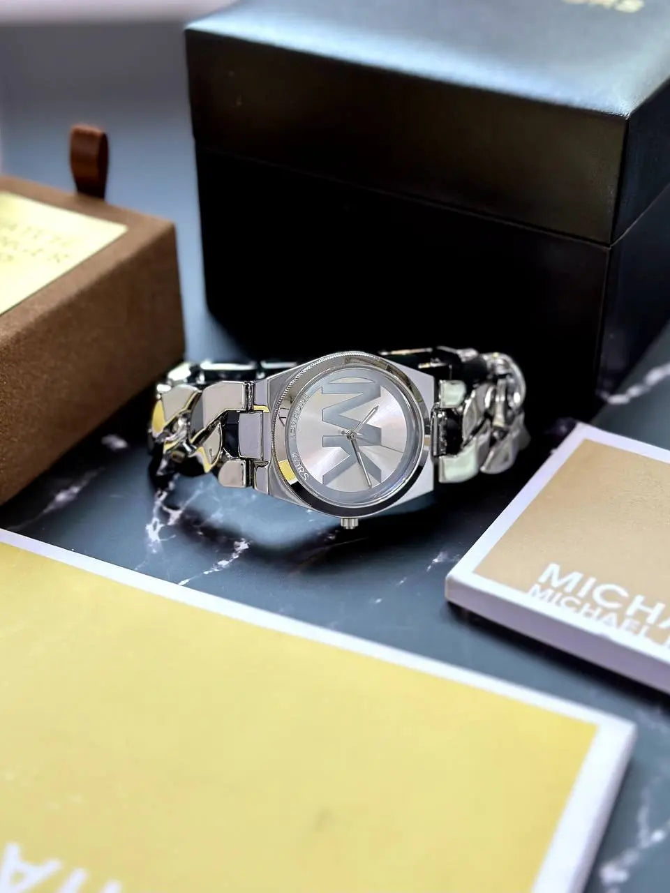 Michael Kors MK4564 Women's Silver Watch – Featuring a luxurious silver finish and 7AA premium quality, this Michael Kors watch exudes elegance and style for any occasion.