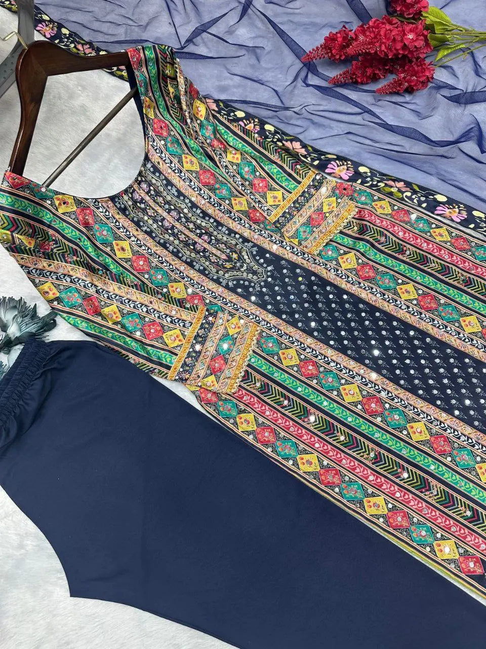 Complete new fancy design top, bottom, and dupatta set for a stylish look.