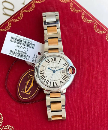 Cartier Ballon Bleu 33mm Women's Watch – A luxurious timepiece with a two-tone stainless steel design, featuring the elegant W69012Z4 model from the 7AAA Premium Collection.