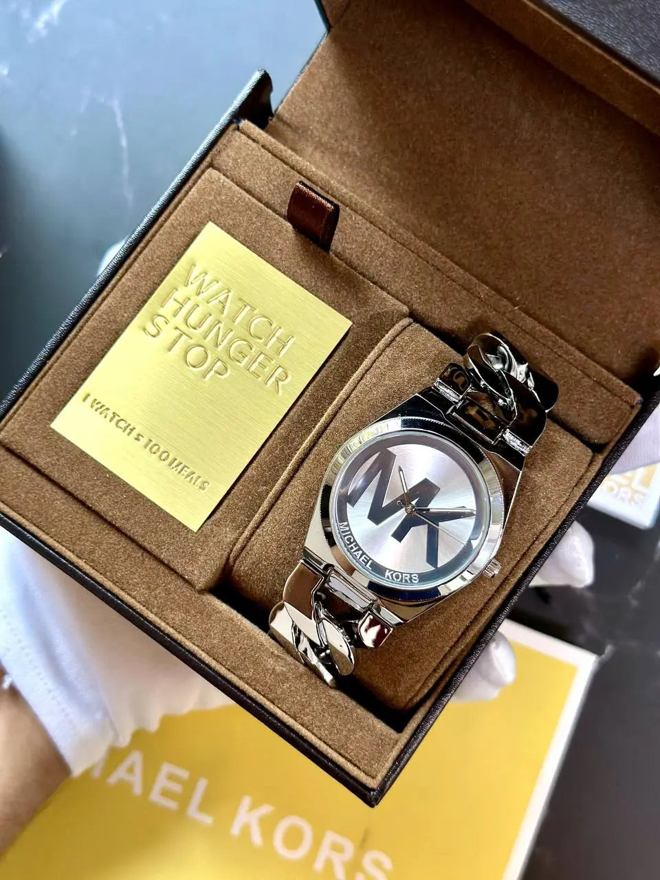MK4564 Michael Kors Silver Watch for Her – A luxury silver watch with a sleek design, 7AA premium quality, and timeless style, perfect for elevating any look.