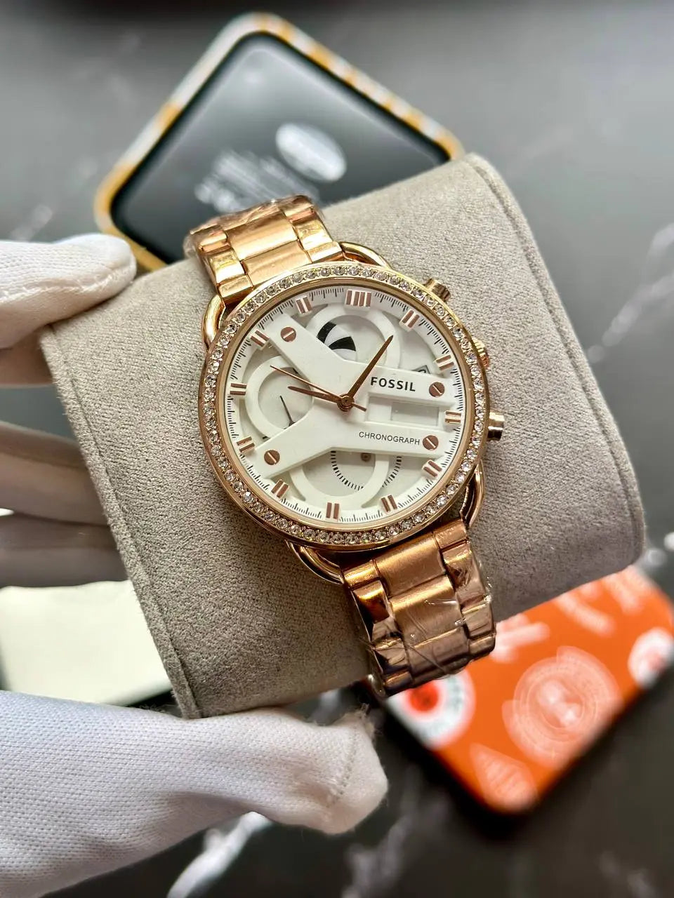 Elegant Fossil Rose Gold Women's Watch – Featuring a distinctive shaped case, 12-hour dial, and 7A quality, this rose gold watch adds a touch of luxury to any outfit.