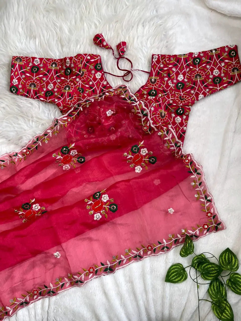 Designer Organza Saree with Sequins Work – Perfect festive wear with shimmering details and fine craftsmanship.