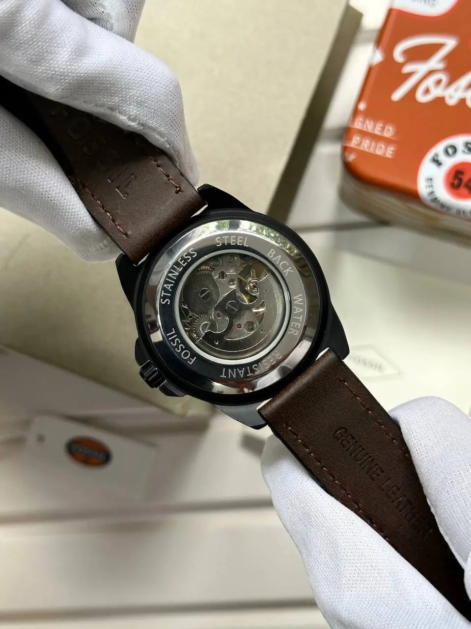 Fossil 7AAA Premium Automatic Watch for Men – Featuring a brown leather strap and skeleton dial, this men's watch offers precision, style, and quality craftsmanship in every detail.