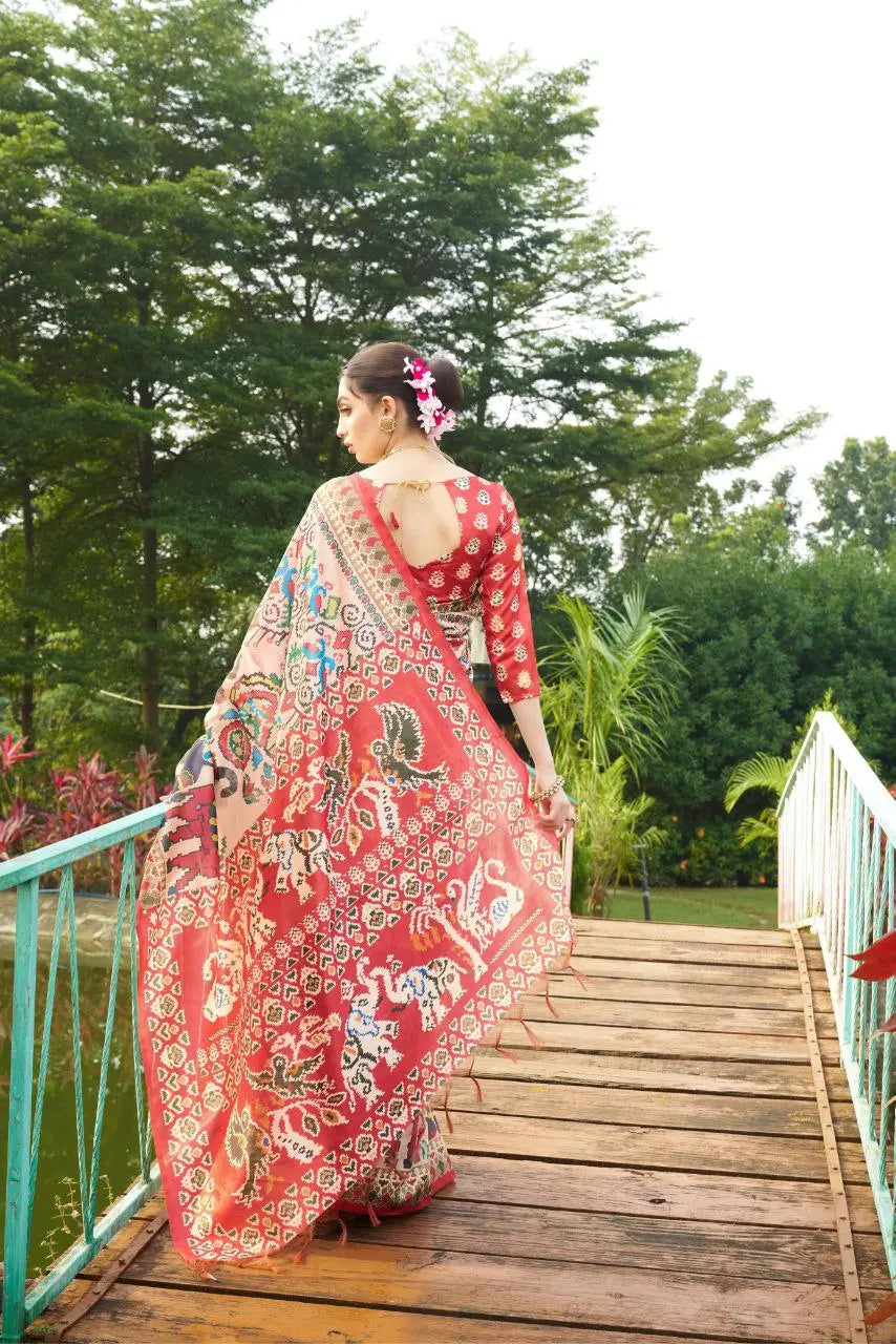 Traditional Patola Saree – Soft Tussar silk saree with vibrant contrast pallu and rich design.