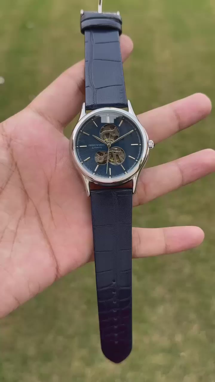 Open back cover showcasing Japanese movement