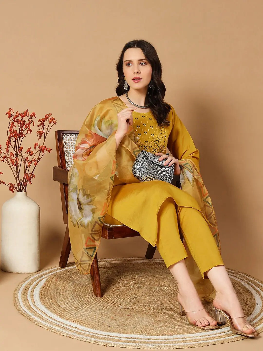 Traditional Indian Kurti set with embroidered details and organza dupatta