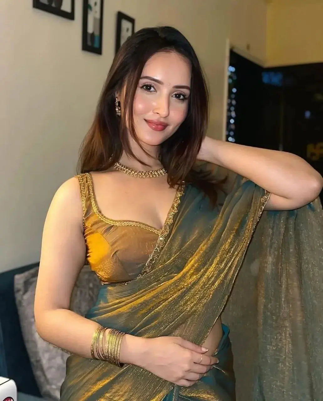 Limited edition golden saree with handcrafted beads work and running blouse