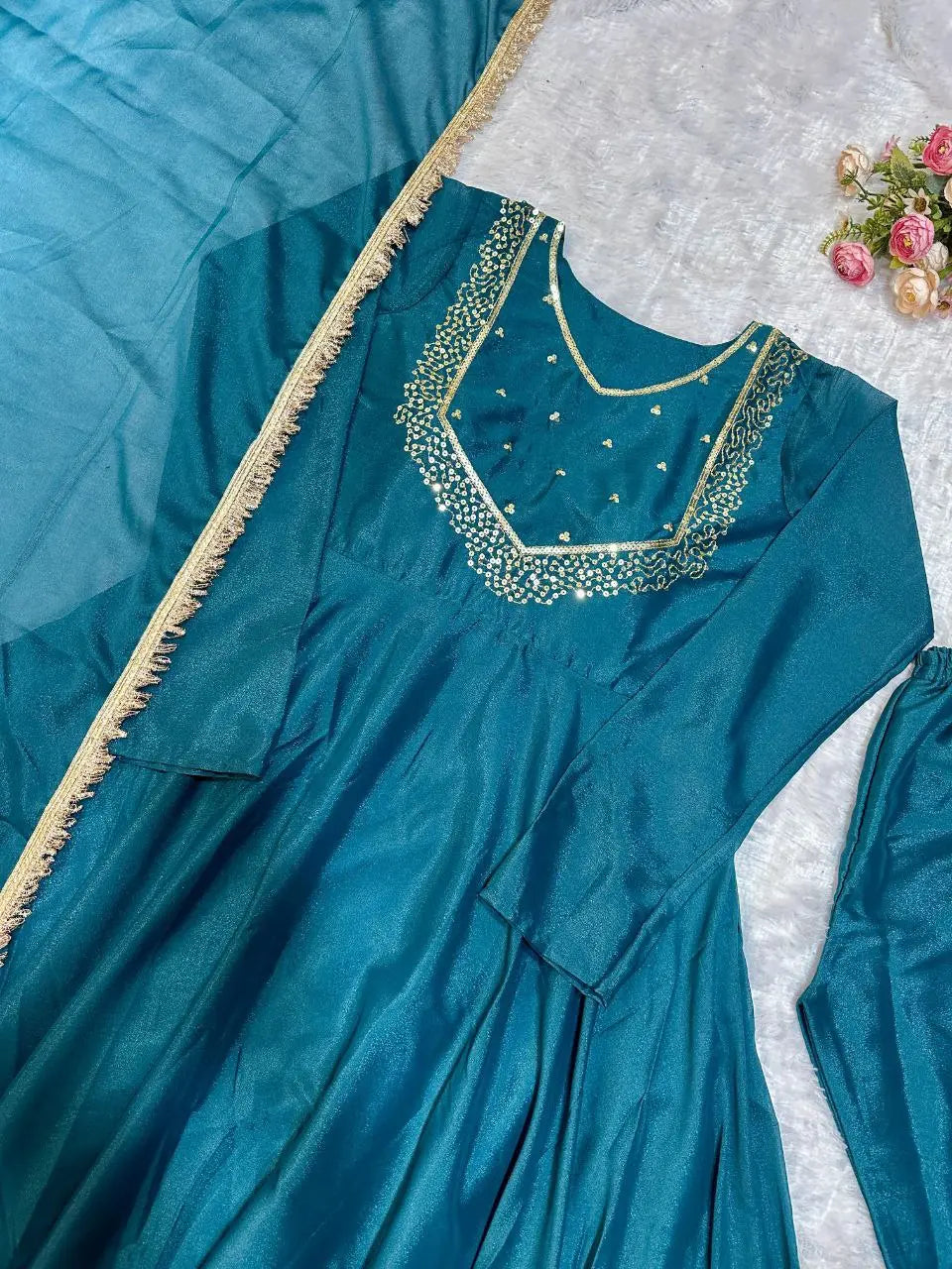 Embroidery close-up on full sleeve gown