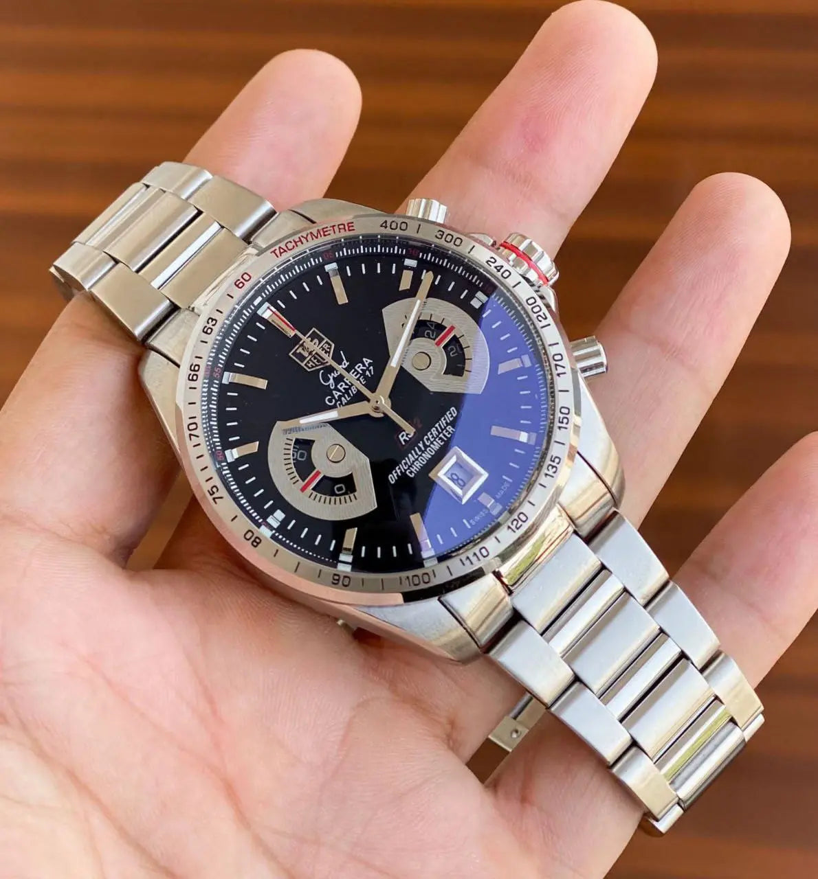 Men’s silver chain analog Tag Heuer watch